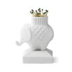 A luxurious, porcelain elephant match strike by Jonathan Adler 