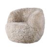 Soft fur swivel chair in beige