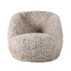 Soft fur swivel chair in beige