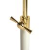A spectacularly chic task floor standing lamp with a polished brass and white lacquered finish