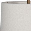 Elegant side lamp with carved travertine base.