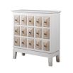 Charming chest of drawers in cream finish with wood panel details and multiple handles
