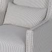 Contemporary silver striped studded armchair