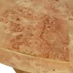 Circular dining table in smooth burl wood finish