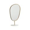 organic shaped table mirror with vintage gold frame and marble base