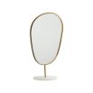 Organic shaped table mirror with vintage gold frame and marble base