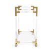An understated glamorous bar cart made from clear acrylic, brushed brass and glass 