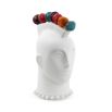 A white porcelain punk-inspired mohawk lollipop holder