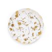 A luxurious dinner plate by Jonathan Adler made from porcelain with splatters of solid gold 