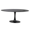 Black marble dining table with timeless oval silhouette
