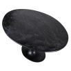 Black marble dining table with timeless oval silhouette