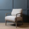Sumptuously plush linen armchair with wooden frame