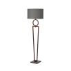 A sophisticated floor lamp with a grey velvet shade