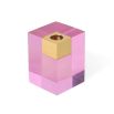 A luxuriously glamorous candleholder by Jonathan Adler with a solid pink acrylic block fitted with a solid brass corner candleholder