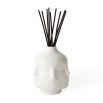 A contemporary glossy white fragranced room diffuser by Jonathan Adler