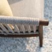 Modern and sleek outdoor dining chair with woven backrest