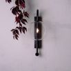 Black gunmetal brass modern industrial wall lamp with large clear glass globe