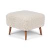 Cosy footrest upholstered in soft sheepskin