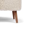 Cosy footrest upholstered in soft sheepskin
