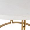 Circular white concrete dining table