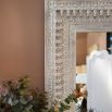 Rectangular wall mirror with carved white-washed wood frame