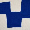 Rectangular cushion with blue and white abstract artwork