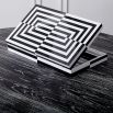 A luxury, monochrome backgammon set by Jonathan Adler with a high-contrast, luxe lacquer and velvet lining