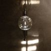 Black gunmetal brass modern industrial wall lamp with large clear glass globe
