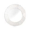 A luxurious round mirror with a simple and subtle panelled frame