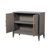 A luxurious 2 door cabinet with interior shelving and antique brass accents