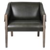 Armchair with green leather and wooden frame