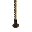 Floor lamp with blocks of ebonised mango wood that border a totem of antique brass spheres