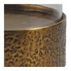 Lantern with textured brass base and cylindrical glass frame
