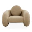 The Pompidou Lounge Chair is a deep, cozy cocoon with a tubular framework, upholstered in Valais Latte bouclé for ultimate comfort.