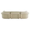 Curvaceous boucle cream three seater sofa with deep buttoning detail on backrest