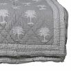Grey bedspread with palm print