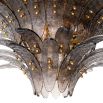 A luxury chandelier by Eichholtz with a tiered design