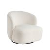 A luxurious armchair with a sumptuous upholstery and stylish swivel base