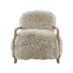 The Baaarb Accent Chair, featuring real cream sheepskin and a solid oak frame, adds Scandi-inspired charm and luxury to any room.