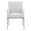 The Sloane Dining Armchair combines mid-century modern elegance with forged brass gold legs and off-white C0 fabric upholstery, offering both style and comfort.