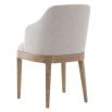 The Kingham Dining Chair features a solid oak frame, exposed seat, and luxurious linen upholstery, offering a timeless and elegant choice for everyday dining.