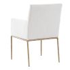 The Sloane Dining Armchair combines mid-century modern elegance with forged brass gold legs and off-white C0 fabric upholstery, offering both style and comfort.