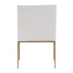 The Sloane Dining Armchair combines mid-century modern elegance with forged brass gold legs and off-white C0 fabric upholstery, offering both style and comfort.