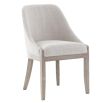 The Burford Dining Chair, with its generous seat, curved back, and solid oak frame in American washed new grey, brings modern sophistication and luxury to everyday dining.