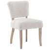 The Winnie Dining Chair, upholstered in faux sheepskin and set on a solid oak frame, brings Alpine charm and style to your dining room.