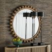 Natural finished round mirror with wooden spheres surrounding the border