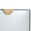 Rectangular wall mirror with black border and brass semi-circle clips 