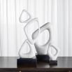 Elegant stacked loops sculpture in white finish