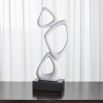 Elegant stacked loops sculpture in white finish