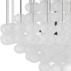 Dozens of frosted glass baubles suspended from bronze chains